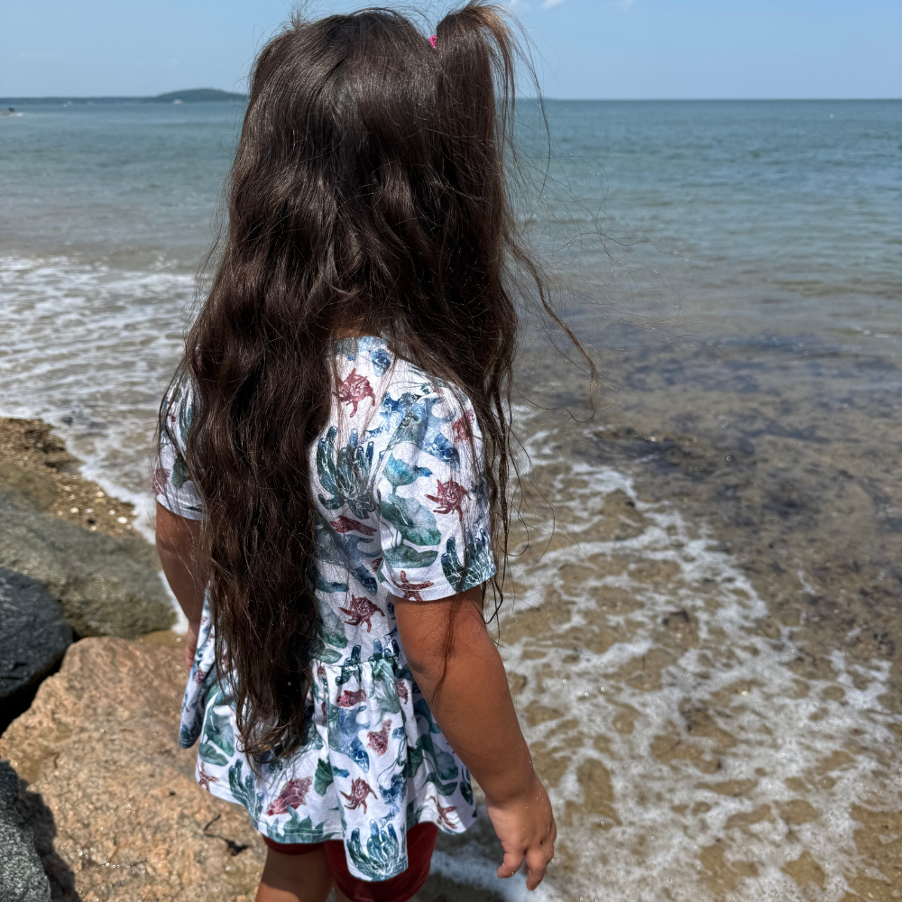 Bamboo Short Sleeve Peplum Top in Catch Some Rays