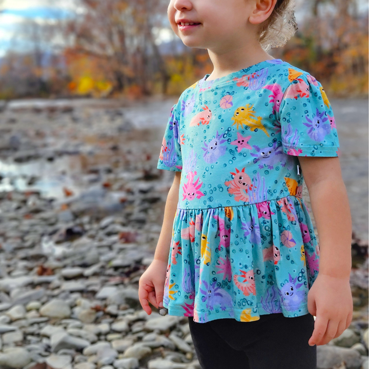 Bamboo Short Sleeve Peplum Top in Axolotl Questions