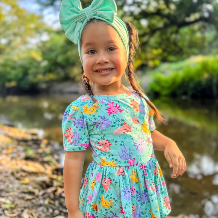 Bamboo Short Sleeve Peplum Top in Axolotl Questions